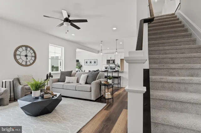 a picture of a book shelf with a bench