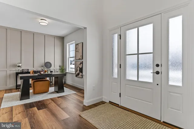 a living room with furniture and window