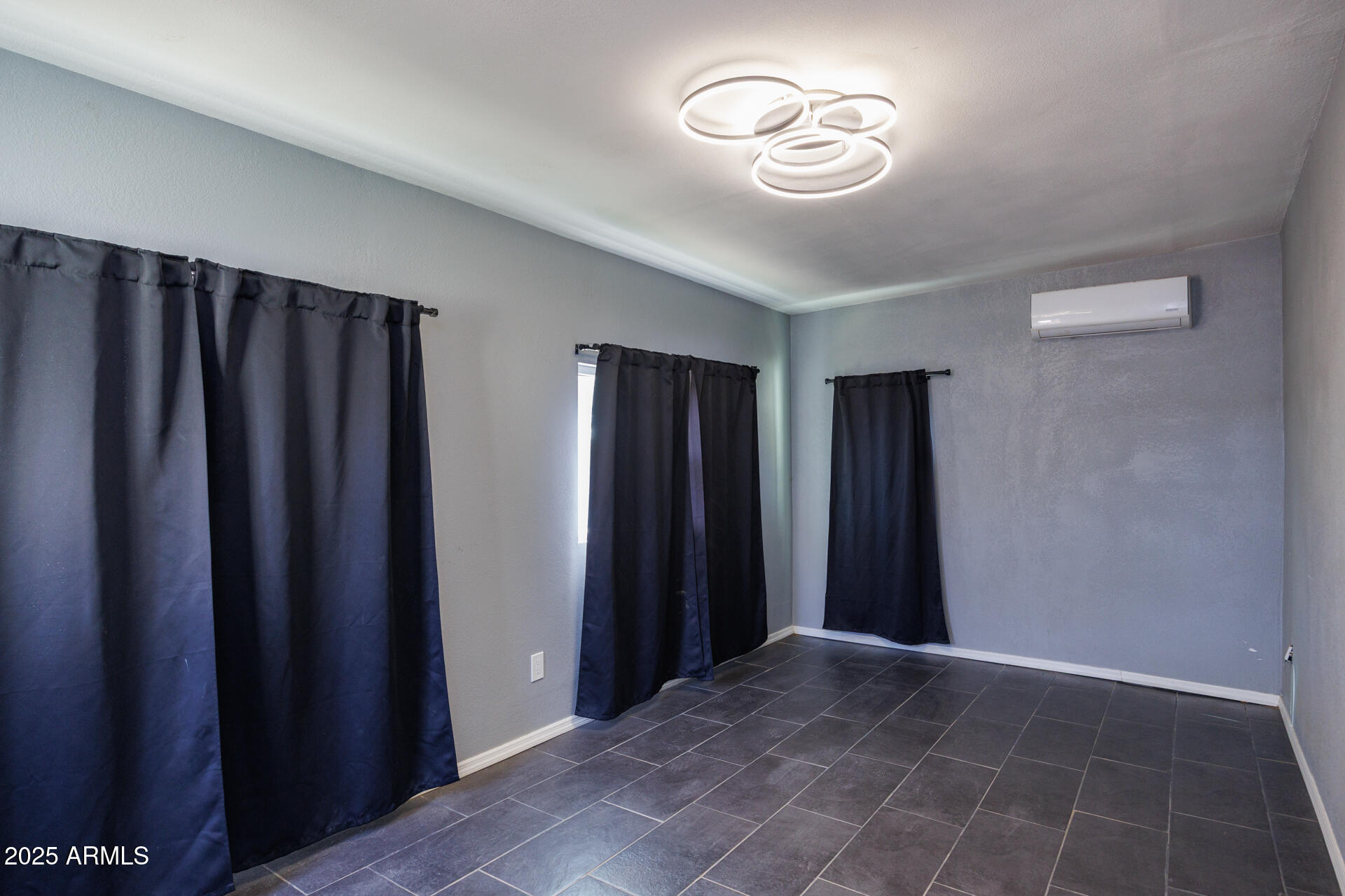 14169 South Tampico Road Arizona City, AZ 85123 - Photo 15 of 38 a view of an empty room with a window