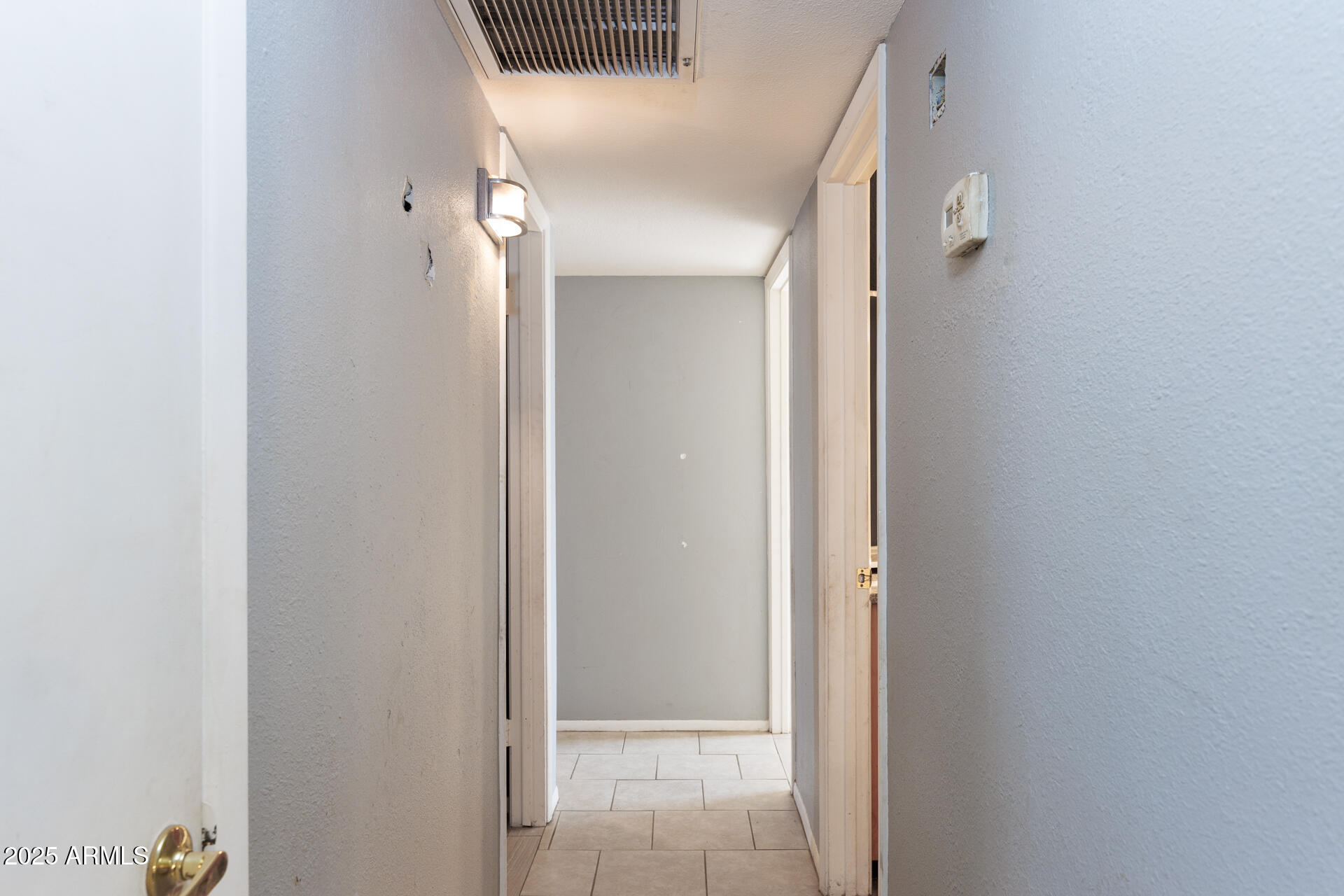 14169 South Tampico Road Arizona City, AZ 85123 - Photo 16 of 38 a view of a hallway