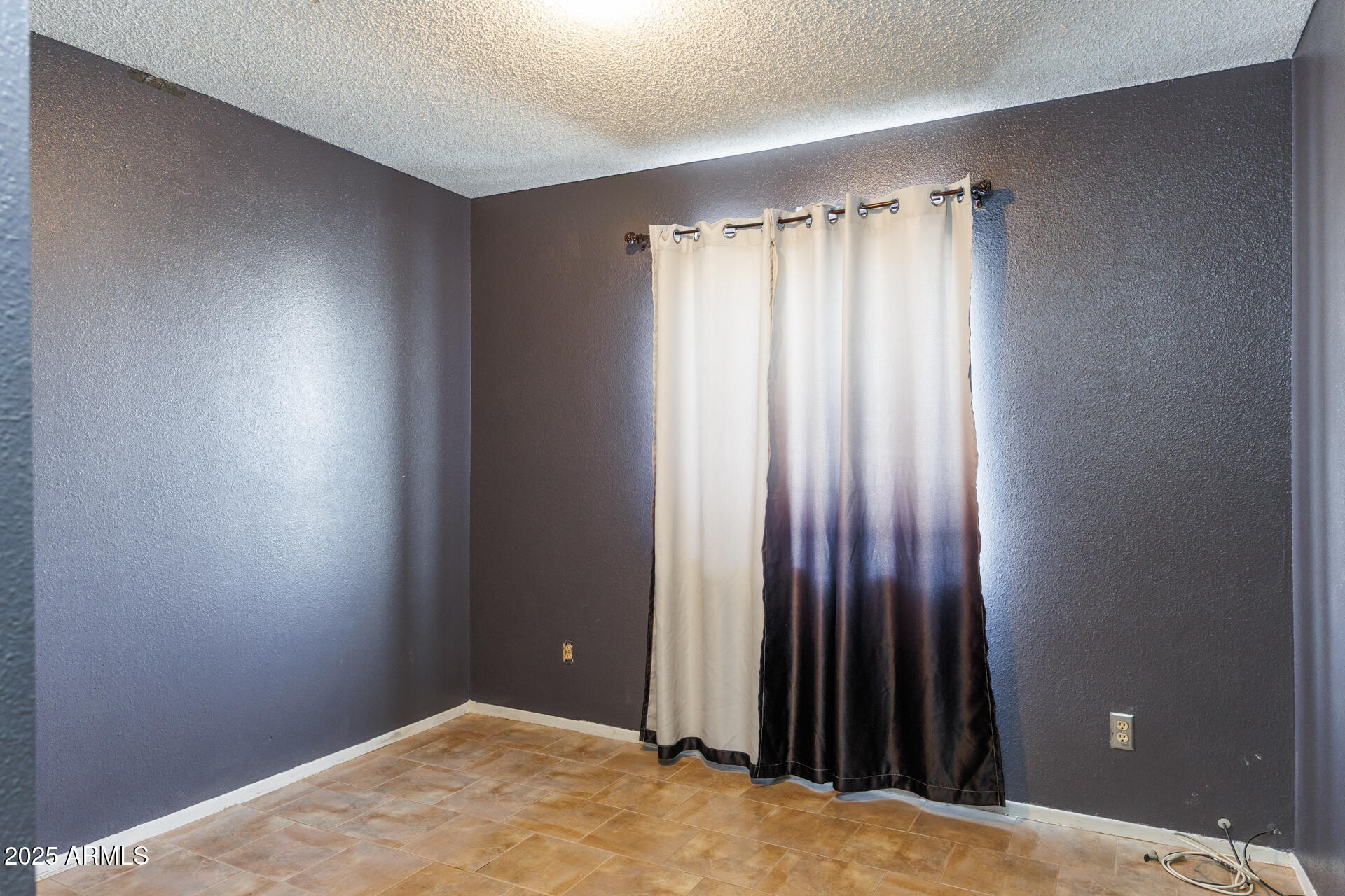 14169 South Tampico Road Arizona City, AZ 85123 - Photo 23 of 38 a view of a room with a wooden door