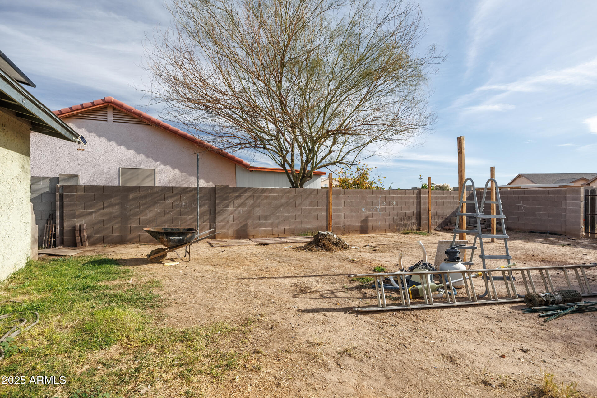 14169 South Tampico Road Arizona City, AZ 85123 - Photo 31 of 38 a view of a backyard of the house