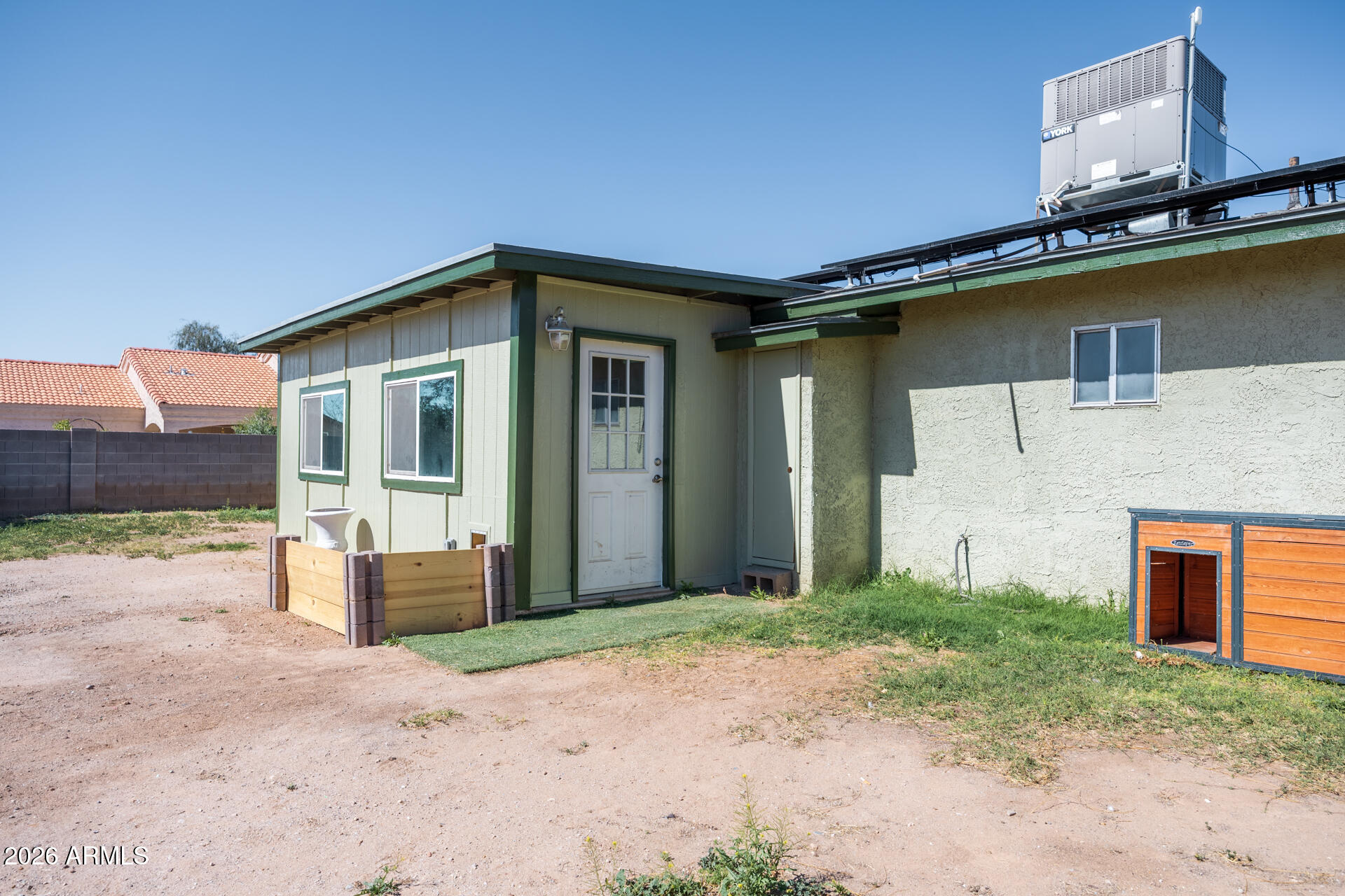 14169 South Tampico Road Arizona City, AZ 85123 - Photo 32 of 38 a front view of a house with a yard