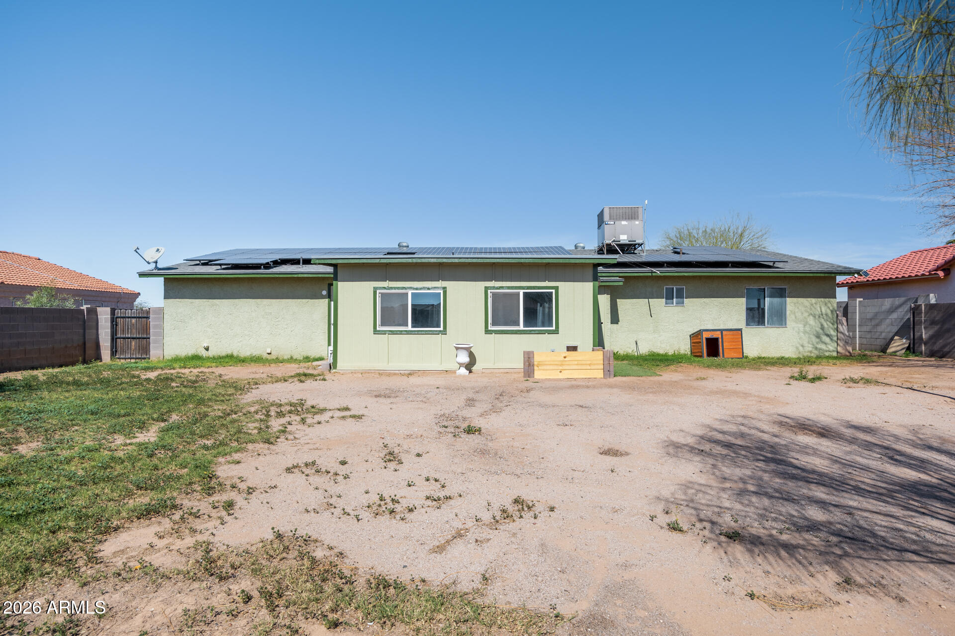 14169 South Tampico Road Arizona City, AZ 85123 - Photo 33 of 38 a front view of a house with a yard and a garage