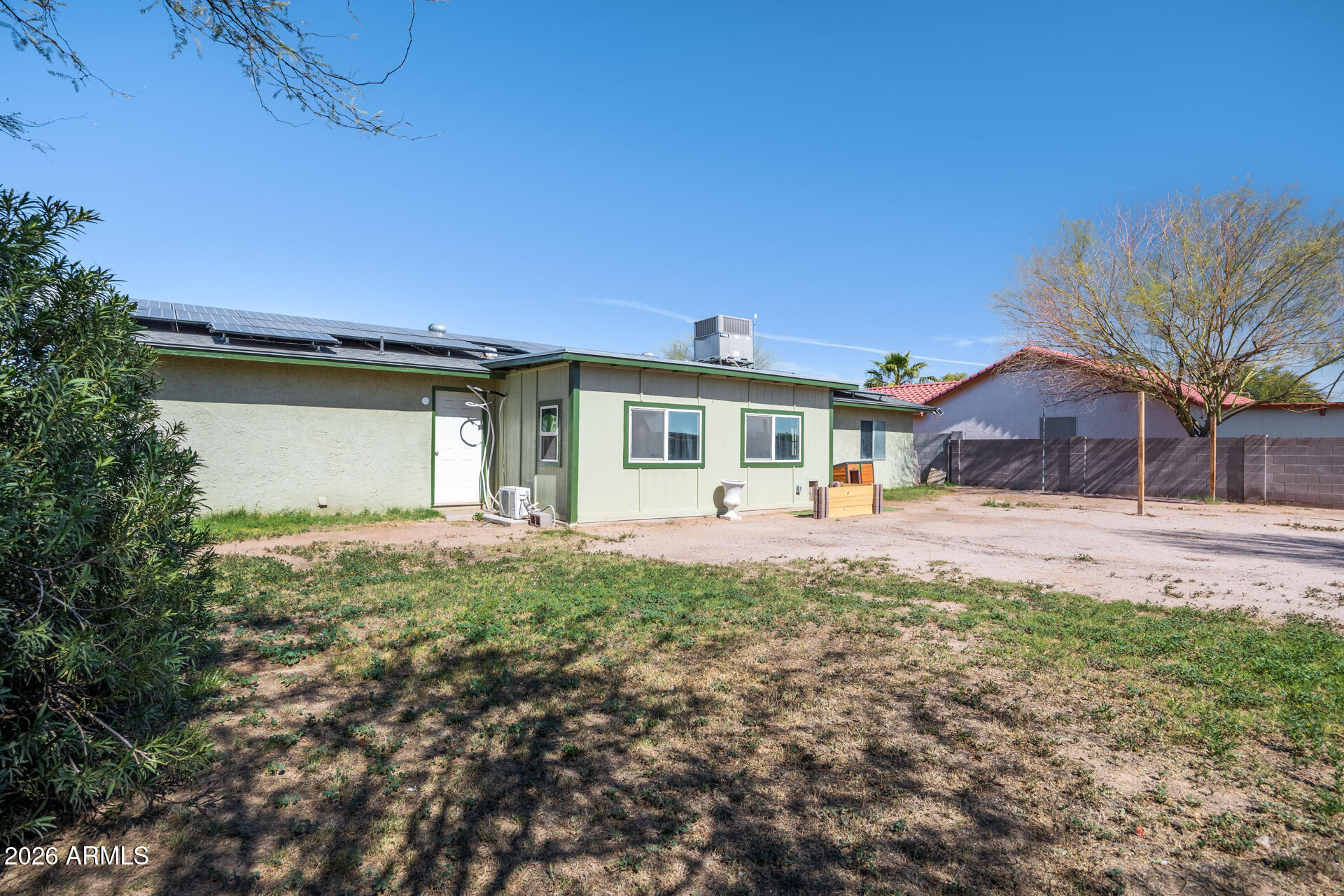 14169 South Tampico Road Arizona City, AZ 85123 - Photo 34 of 38 a view of a house with backyard and sitting area
