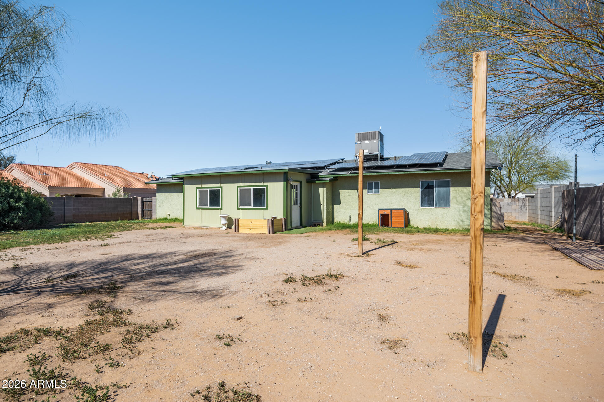 14169 South Tampico Road Arizona City, AZ 85123 - Photo 36 of 38 a front view of a house with a yard