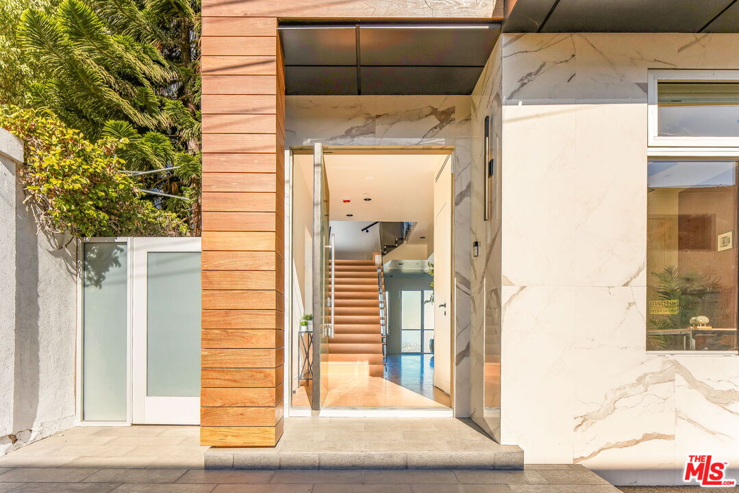 1610 Viewmont Drive Los Angeles, CA 90069 - Photo 1 of 22 a view of entrance door of the house