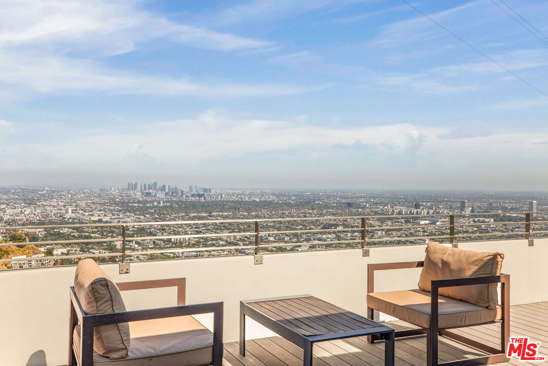 1610 Viewmont Drive Los Angeles, CA 90069 - Photo 18 of 22 a view of a terrace with chairs