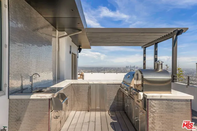 a view of a terrace with seating area