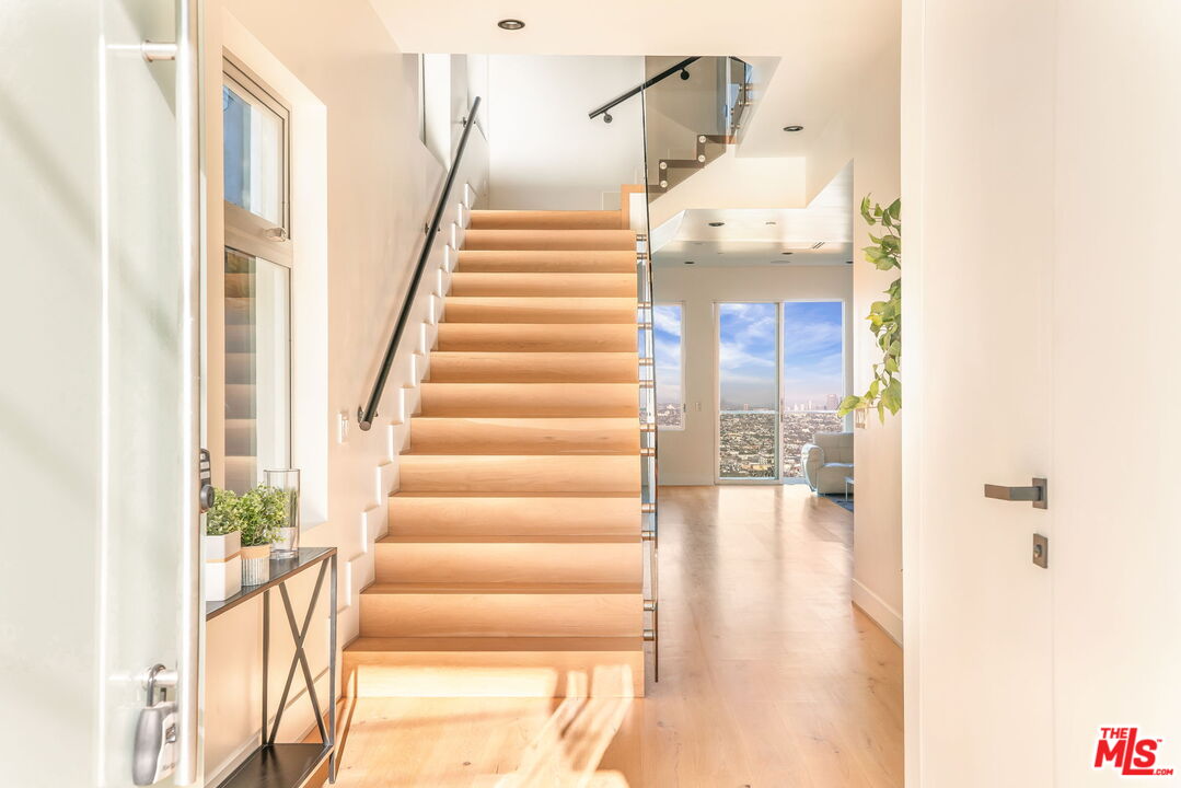 1610 Viewmont Drive Los Angeles, CA 90069 - Photo 2 of 22 a view of entryway and hall with wooden floor