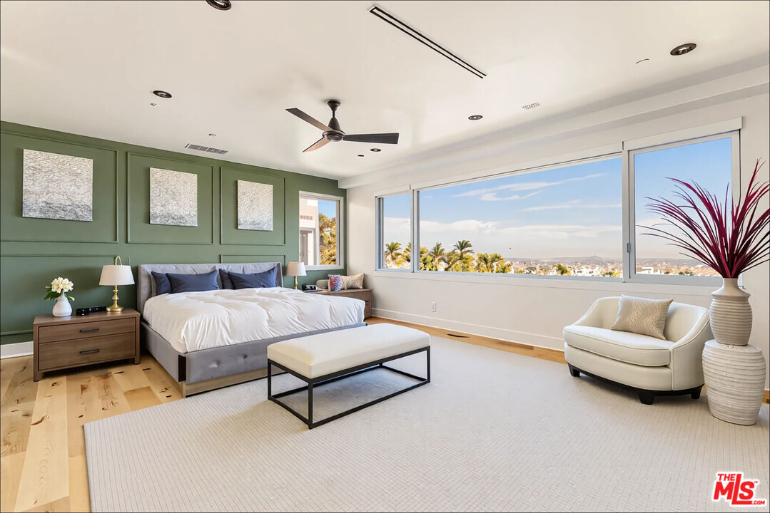 1610 Viewmont Drive Los Angeles, CA 90069 - Photo 9 of 22 a living room with furniture and a large window