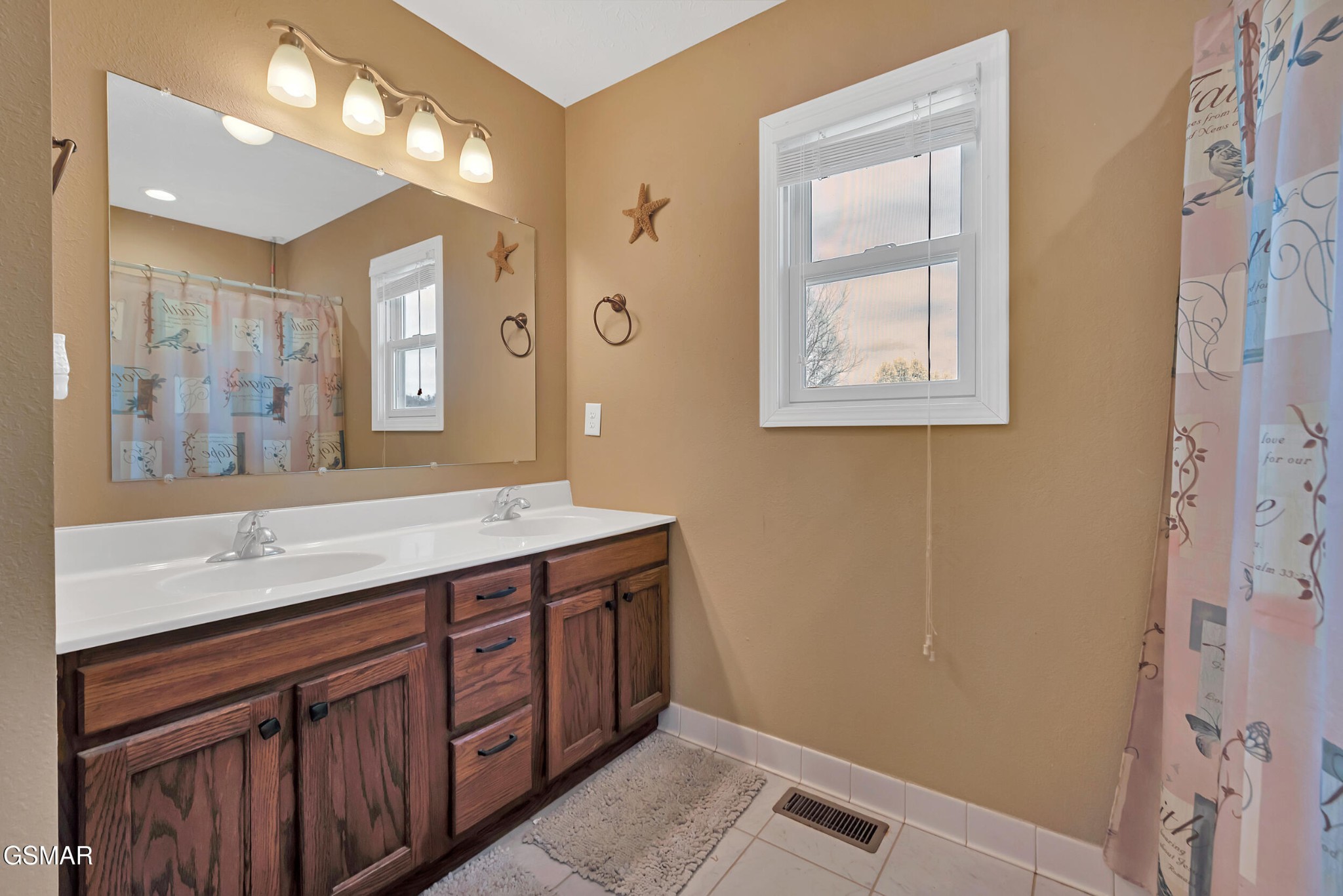 274 Ramblin Road Newport, TN 37821 - Photo 27 of 32 a bathroom with a granite countertop double vanity sink and a mirror