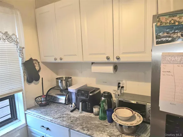a kitchen with a stove and a sink