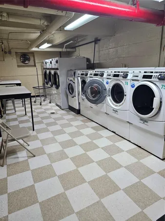 a sign that is in front of flowers