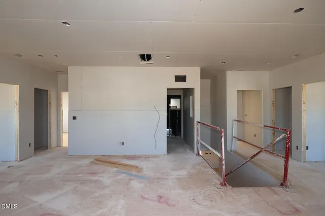 wooden floor and window in an empty room