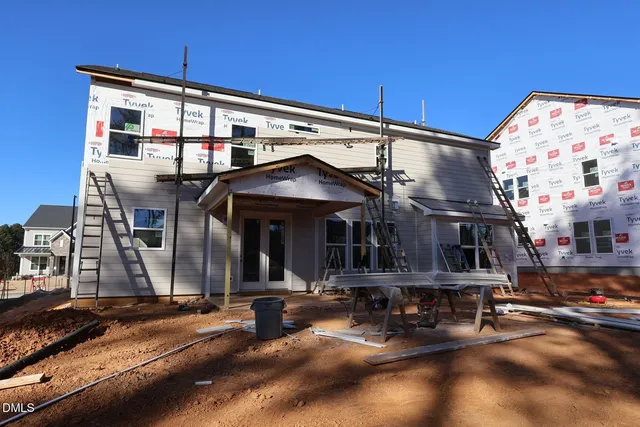 a view of a building with sitting area
