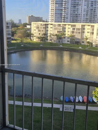 a view of swimming pool from a balcony