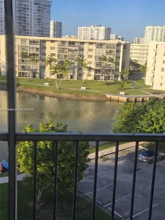 a view of swimming pool from a balcony