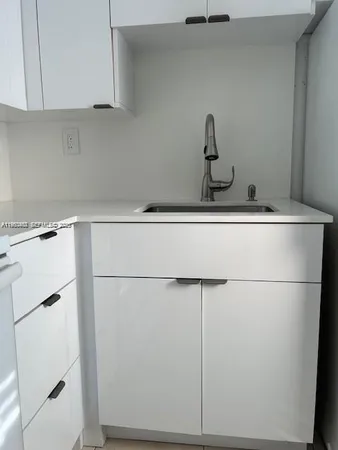 a view of a room that has a window in it