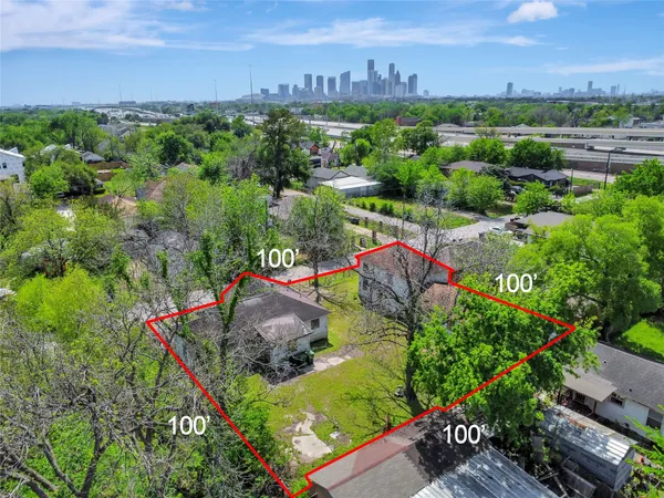 an aerial view of house and yard