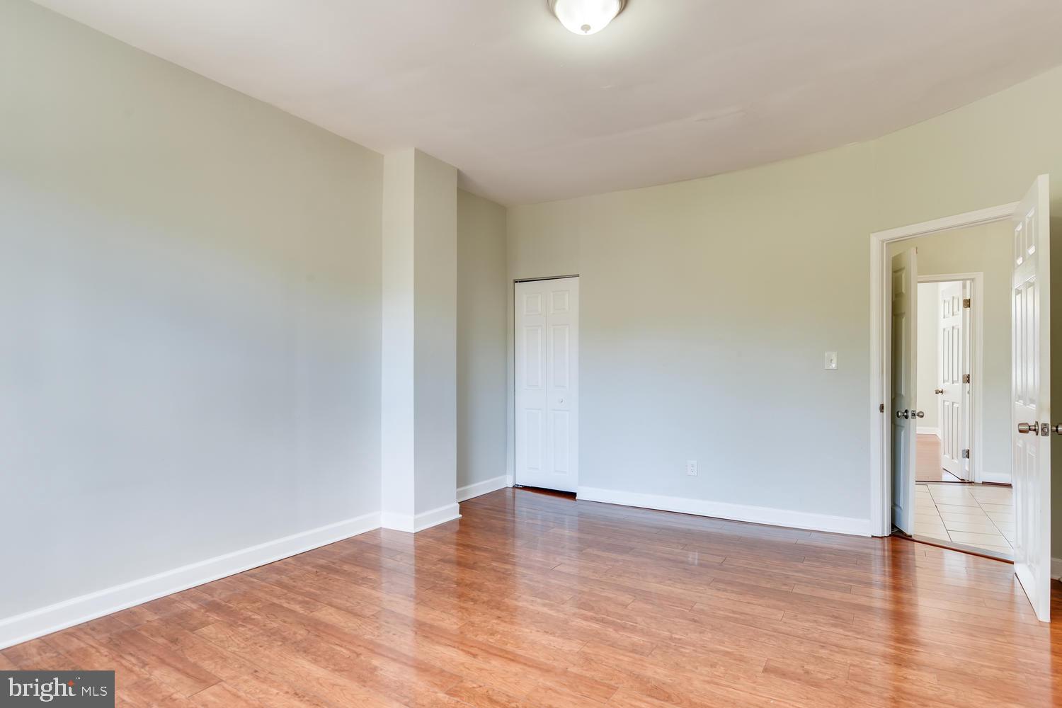 3610 Greenmount Avenue Baltimore, MD 21218 - Photo 17 of 24 a view of empty room with wooden floor