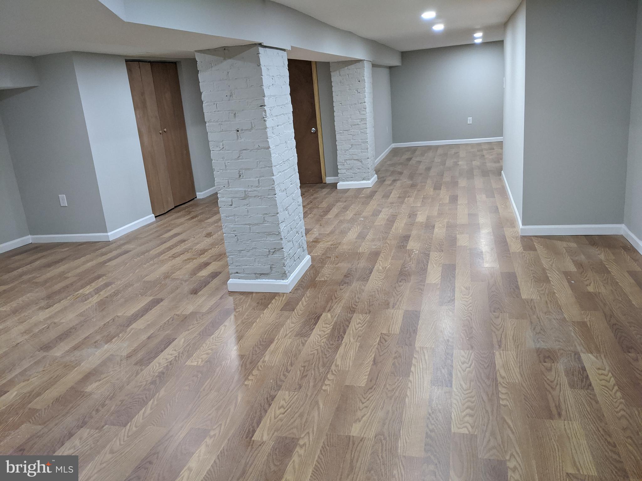 3610 Greenmount Avenue Baltimore, MD 21218 - Photo 24 of 24 a view of empty room with wooden floor