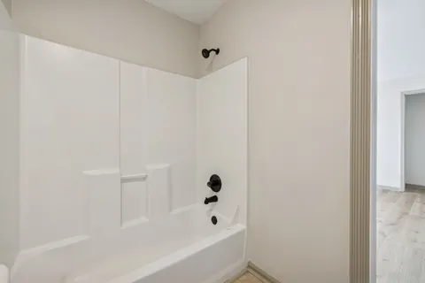 a bathroom with a bathtub