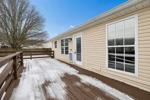 a view of a house with a large window