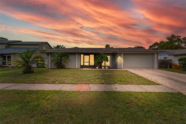 a view of house with outdoor space