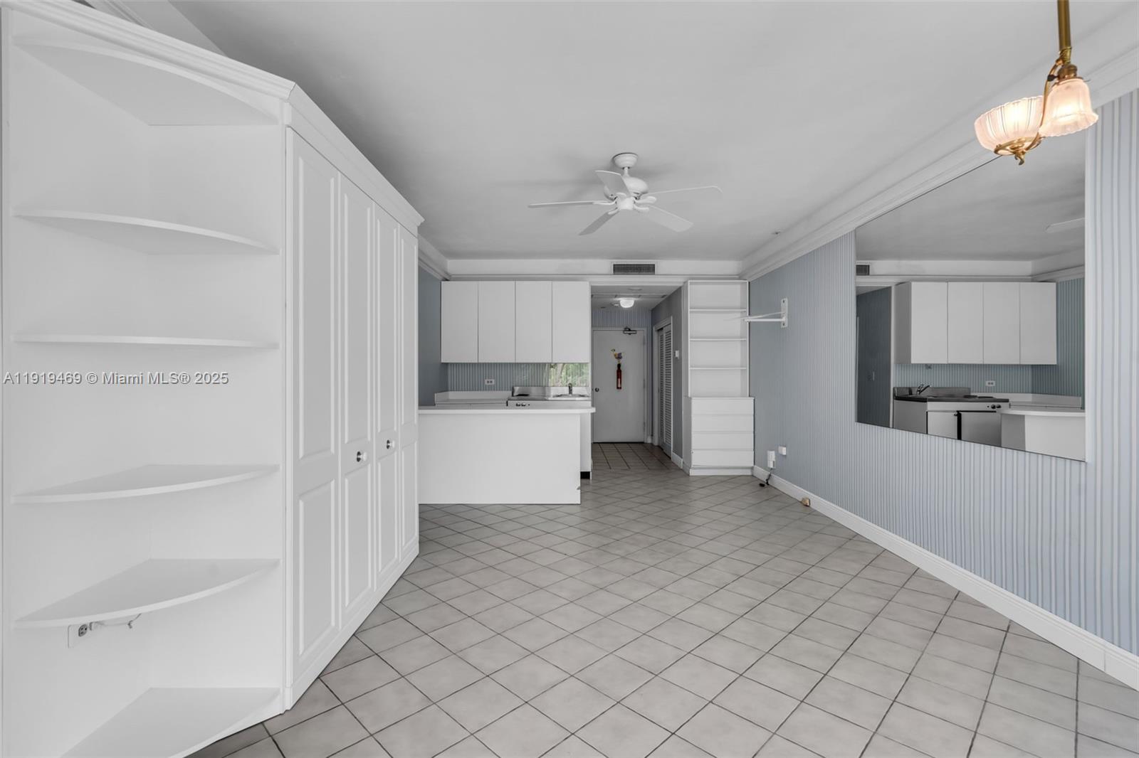 200 Ocean Ln Drive, Unit 407GR09 Key Biscayne, FL 33149 - Photo 29 of 56 a view of a kitchen with wooden floor and a kitchen