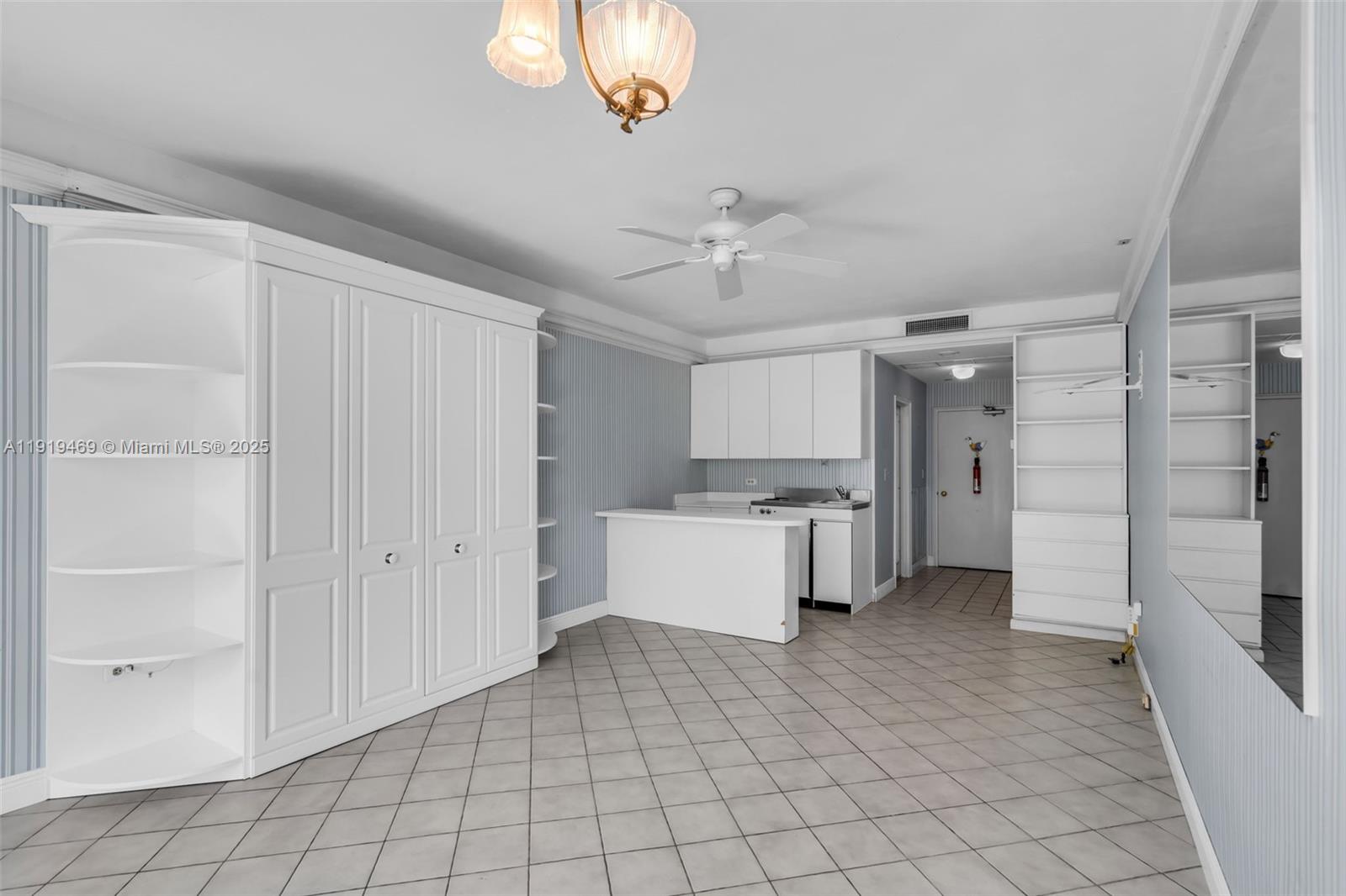 200 Ocean Ln Drive, Unit 407GR09 Key Biscayne, FL 33149 - Photo 30 of 56 a view of a kitchen with a refrigerator and a sink
