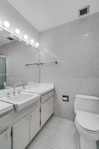 a view of a yard with a table and chairs