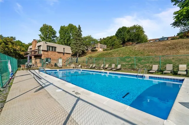 a view of a terrace with a lake view