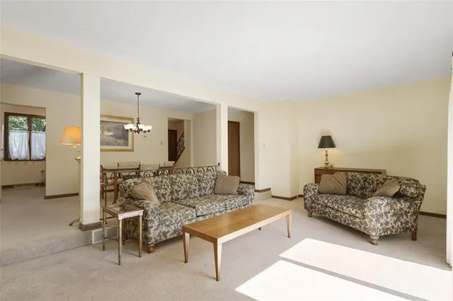 a living room with furniture and a couch