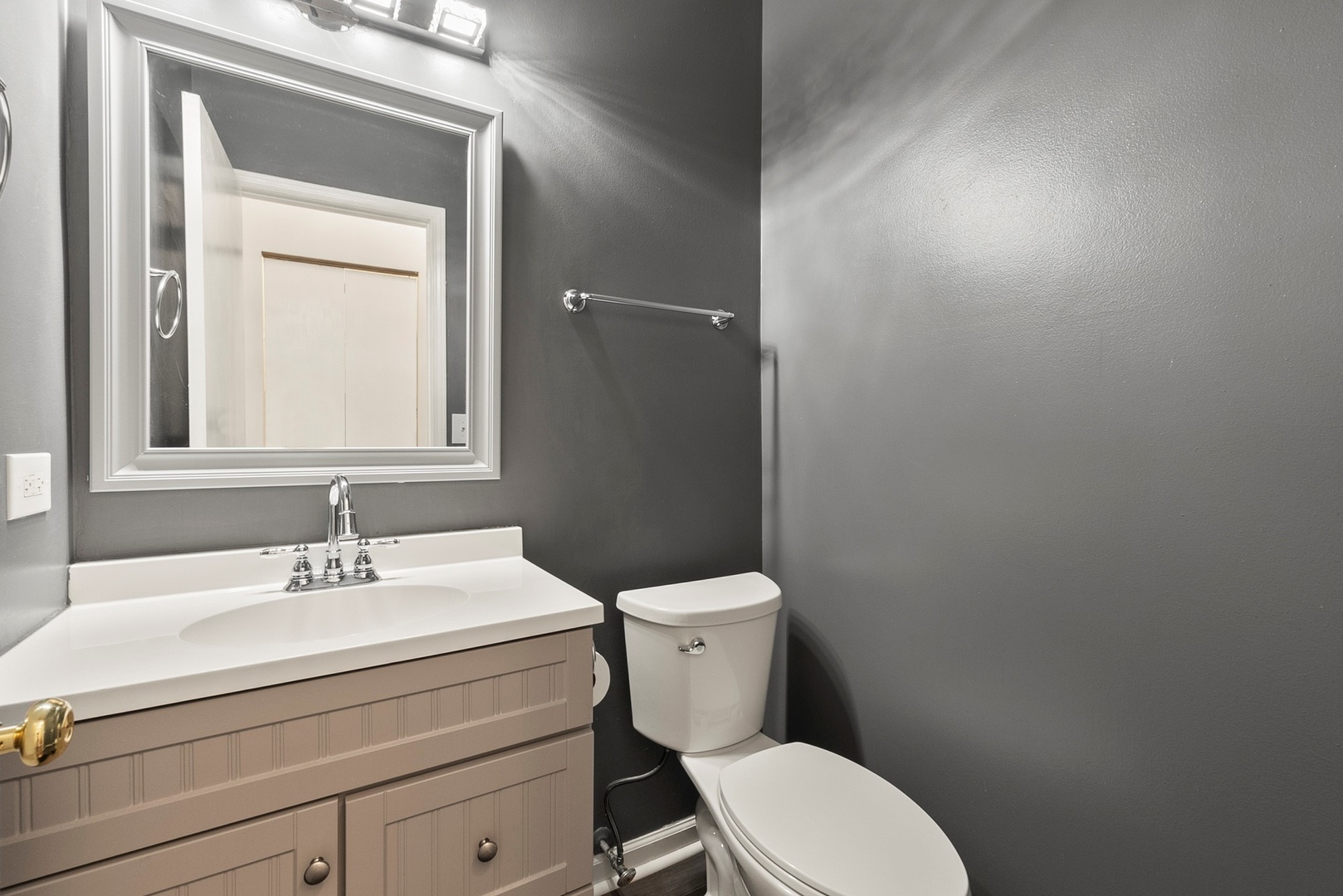 1565 Azalea Circle Romeoville, IL 60446 - Photo 12 of 30 a bathroom with a sink a toilet and mirror