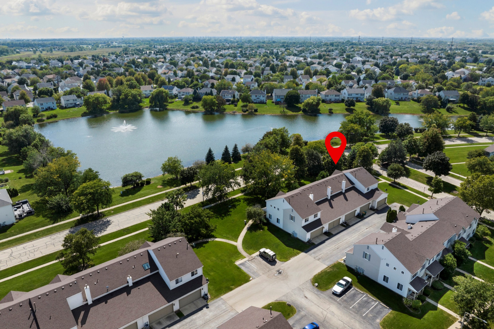 1565 Azalea Circle Romeoville, IL 60446 - Photo 29 of 30 an aerial view of a house with a ocean view