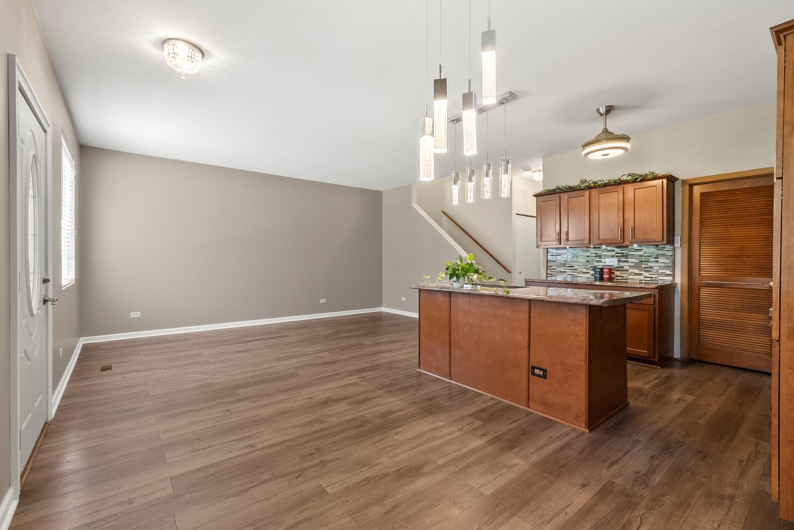 1565 Azalea Circle Romeoville, IL 60446 - Photo 8 of 30 a kitchen with kitchen island a counter top space appliances and cabinets