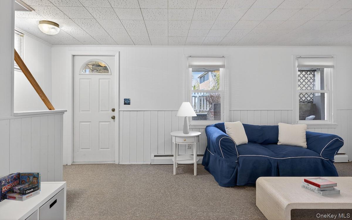 64 Maple Street Dobbs Ferry, NY 10522 - Photo 13 of 36 Family room with door to front yard