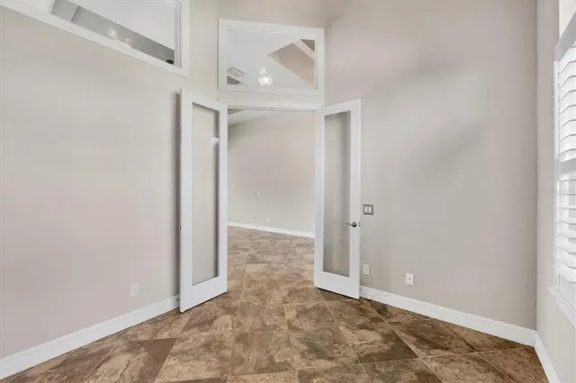 an empty room with a bench