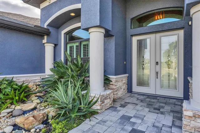 a view of a entryway door front of house