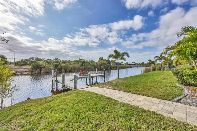 a view of a garden with houses