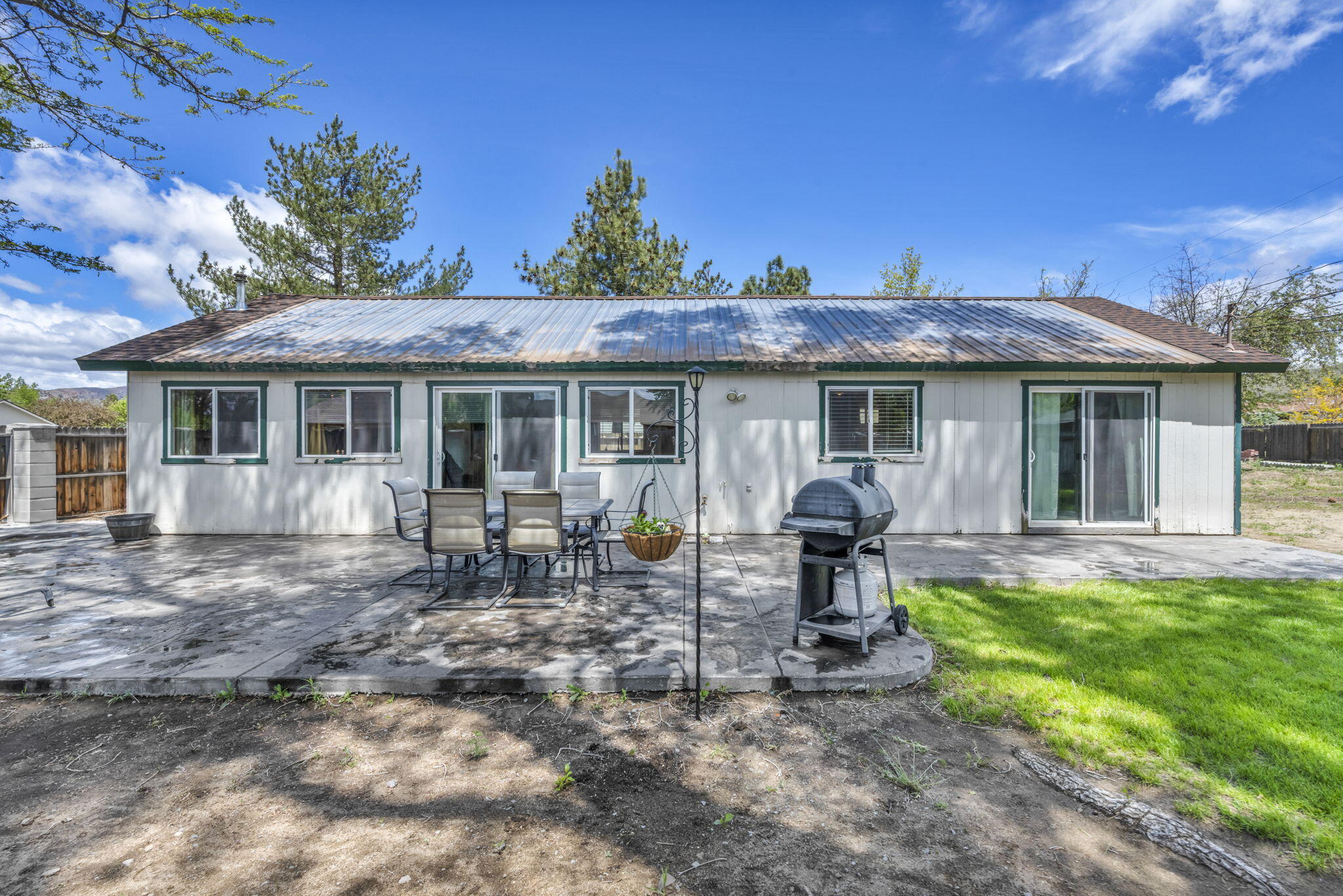 3760 Brant Street Reno, NV 89508 - Photo 28 of 42 a view of a house with a yard chairs and table