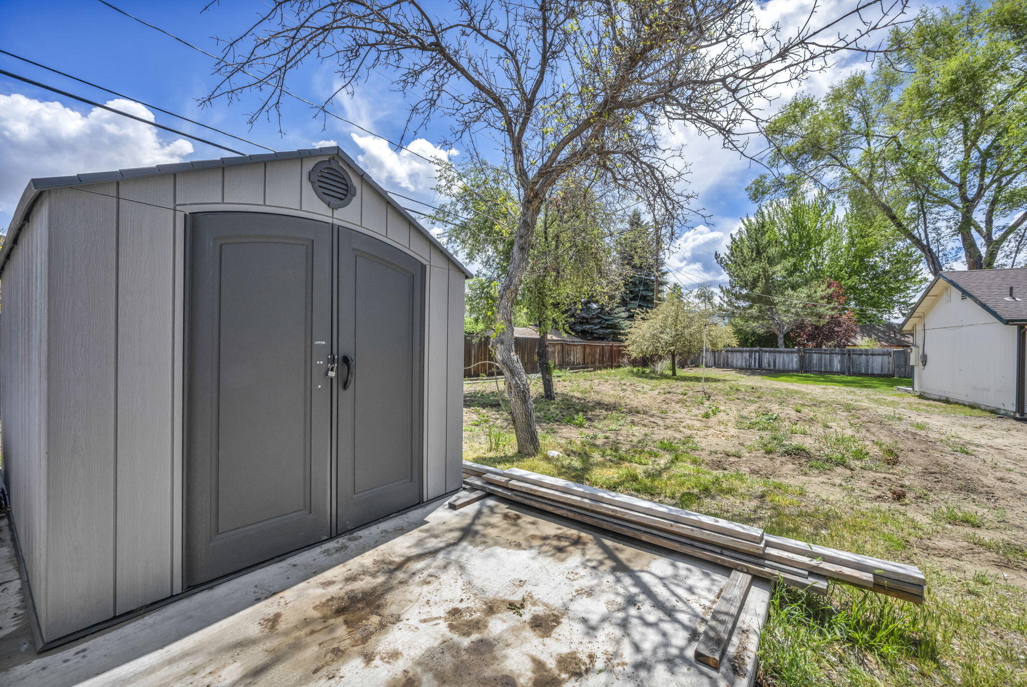 3760 Brant Street Reno, NV 89508 - Photo 40 of 42 a view of a wooden house with a large tree
