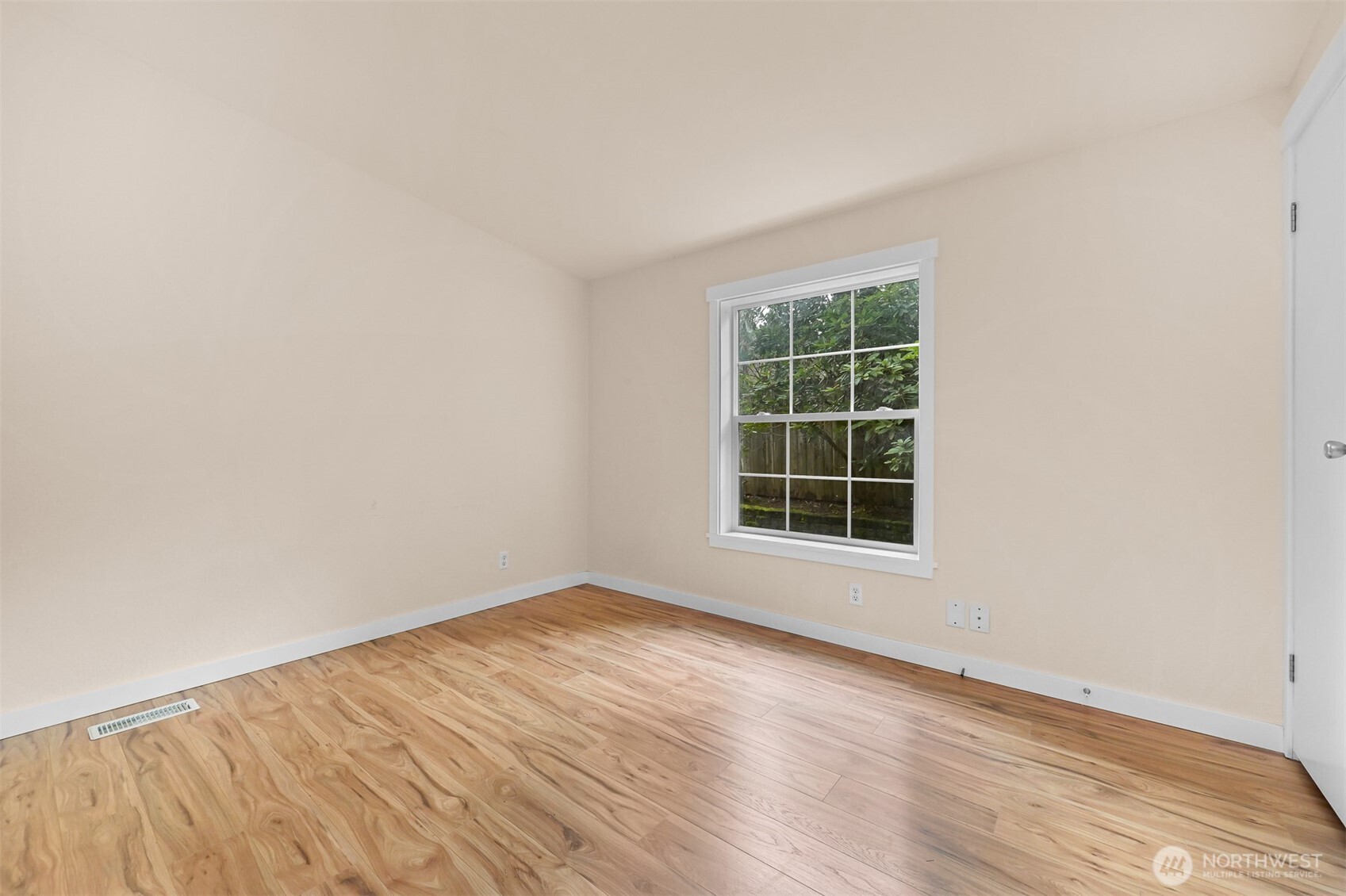 6159 Cedar Lane Maple Falls, WA 98266 - Photo 23 of 31 an empty room with wooden floor and windows