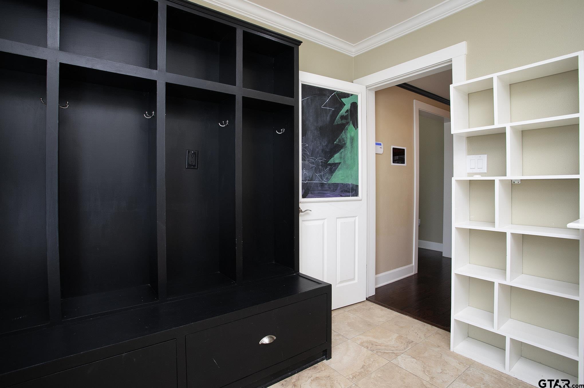 18722 Ridgeline Road Tyler, TX 75703 - Photo 16 of 47 Laundry Room includes custom locker storage for tons of extra room.