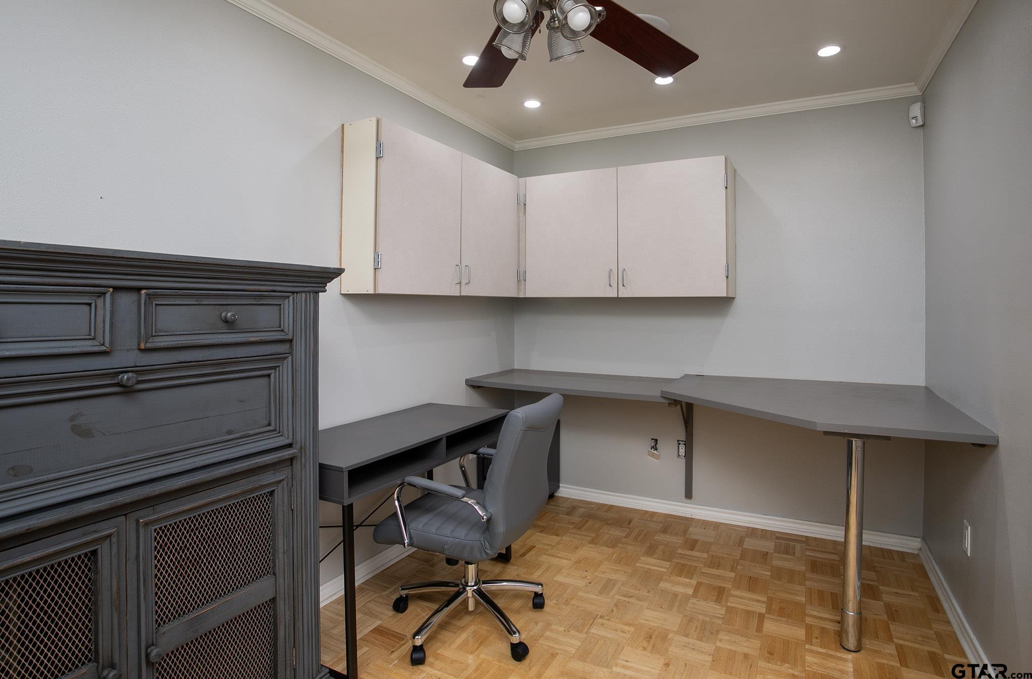 18722 Ridgeline Road Tyler, TX 75703 - Photo 21 of 47 a view of workspace with wooden cabinets