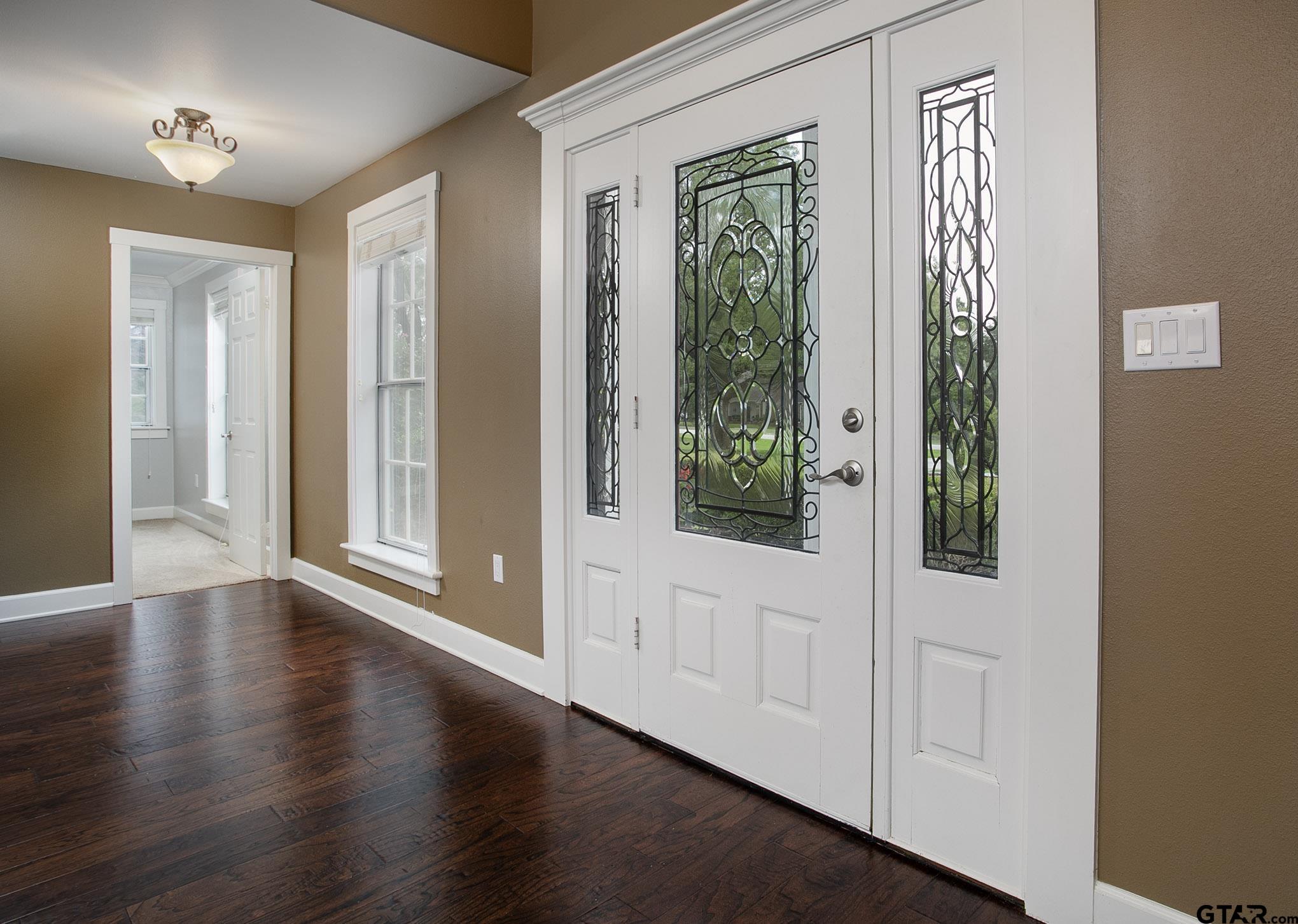 18722 Ridgeline Road Tyler, TX 75703 - Photo 35 of 47 a view of an entryway with wooden floor