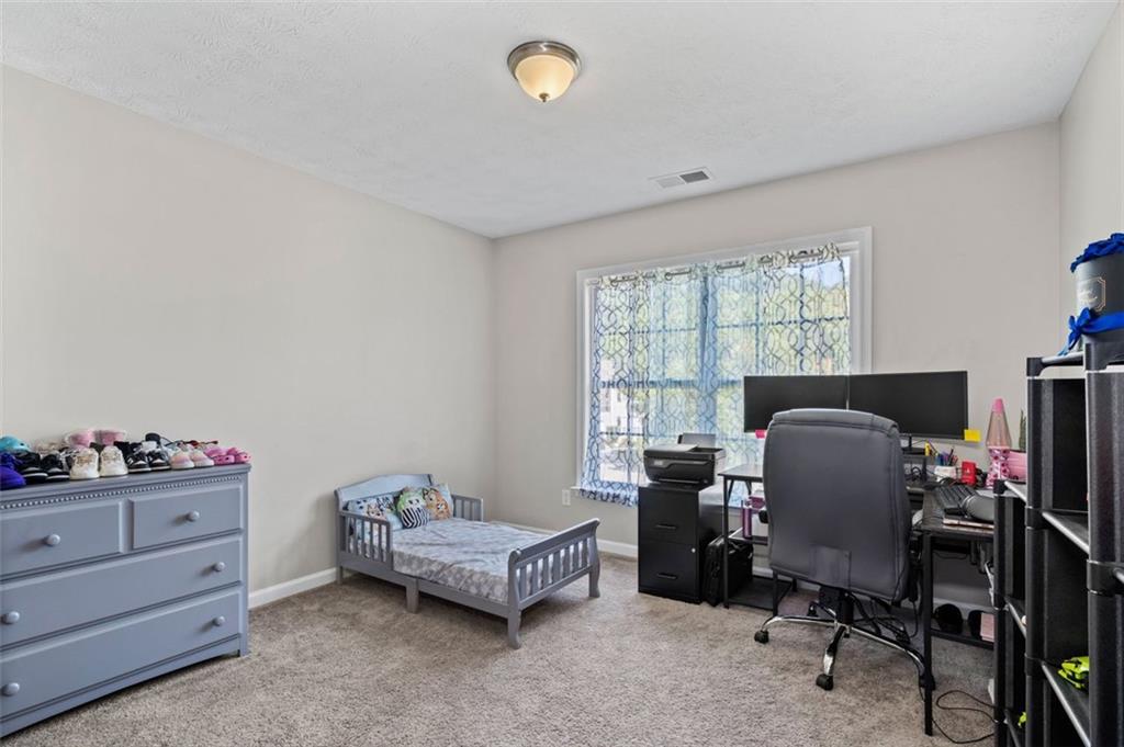 6115 Riveroak Terrace Atlanta, GA 30349 - Photo 29 of 41 a livingroom with a window