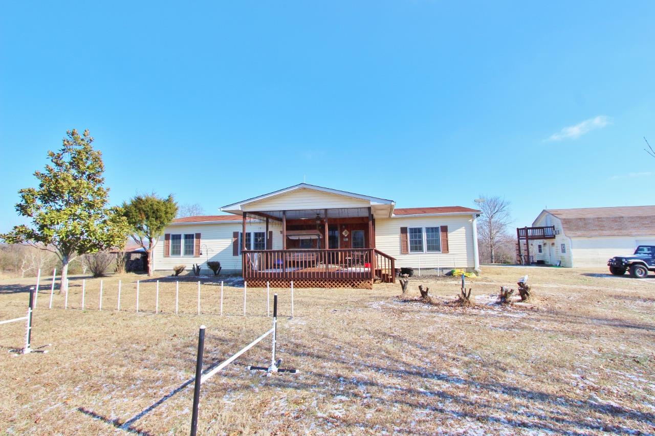 6830 Beasleys Bend Road Lebanon, TN 37087 - Photo 2 of 30 a front view of a house with large garden