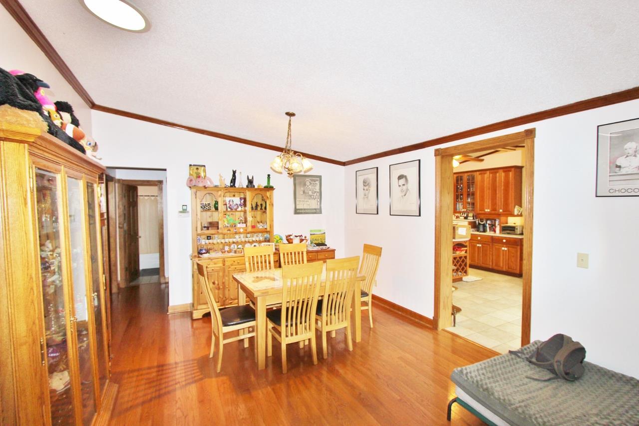 6830 Beasleys Bend Road Lebanon, TN 37087 - Photo 15 of 30 a dining room with furniture and wooden floor